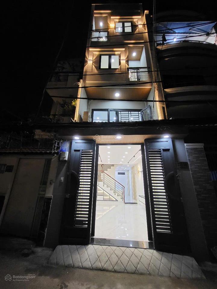 Cần bán nhà mới xinh hẻm 5m nơ trang long gần bệnh viện ung bướu. dt 4x13m. vuông vức. trệt, 3 lầu