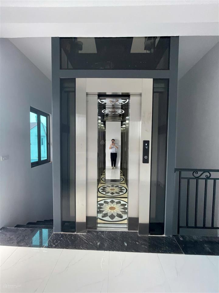 Nhà 2 mặt tiền/2 mặt đường thông ôtô đi qua+thang máy 101m2x4 tầng/ngay gần cầu đại thành(ảnh thật)