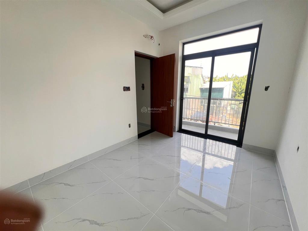 Bán nhà 3 lầu 1 tum sân thượng trước sau ngay trường tiểu học long bình