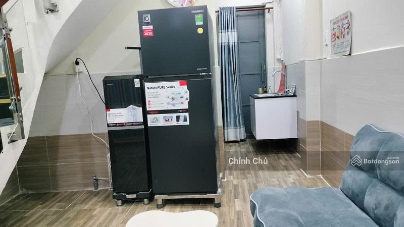 Cho thuê nhà mới 3 mặt tiền 1 trệt 2 lầu + sân thượng, dtsd 105m2, 2pn,full nội thất, p.bến thành