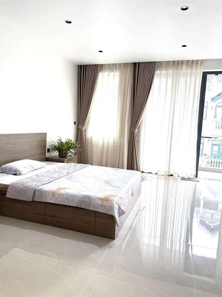 Bán biệt thự mới siêu đẹp đường số 20, p. an nhơn, dt 8x16,6m đúc 1t1l3l thang máy, giá 29,5 tỷ
