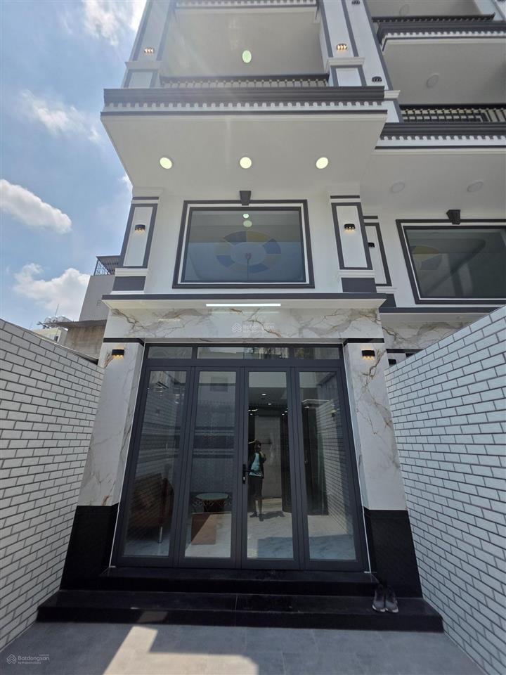 Nhà 1/ dương quảng hàm, hẻm xe hơi 4x16 đúc 1 lửng 4 lầu  thang máy  giá 9,5 tỷ