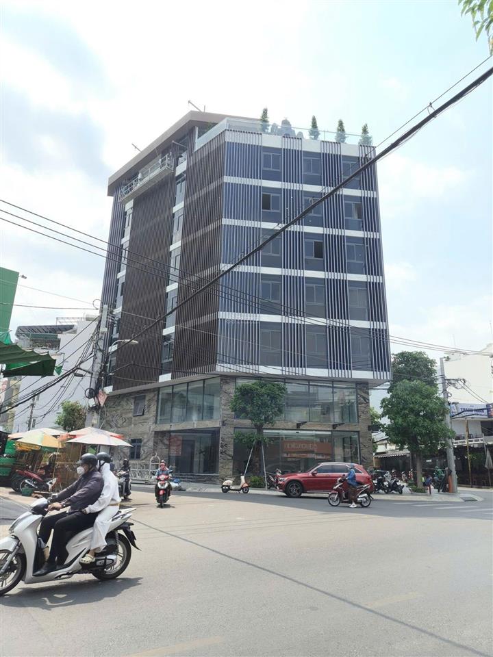 Tòa nhà góc 14m x 22m hầm trệt 6 lầu, thang máy pccc