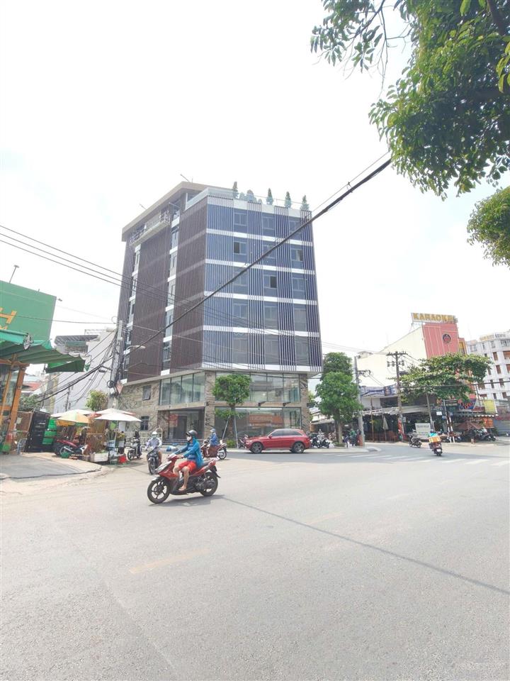 Tòa nhà góc 14m x 22m hầm trệt 6 lầu, thang máy pccc