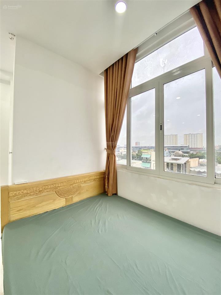 Phòng studio ban công nguyễn hữu cảnh full nội thất cửa sổ thoáng, có thang máy