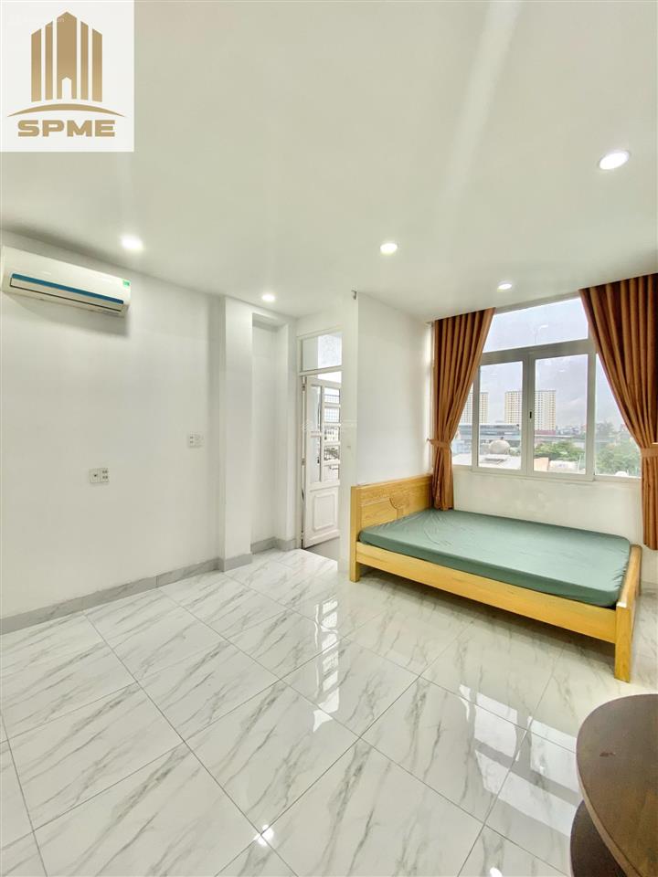 Phòng studio ban công nguyễn hữu cảnh full nội thất cửa sổ thoáng, có thang máy