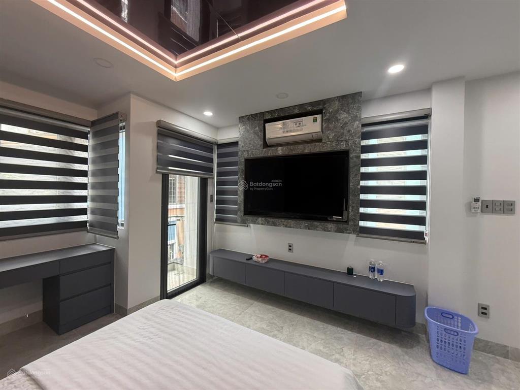 Bán tòa nhà chdv 5 tầng lầu 13pn  13 wc