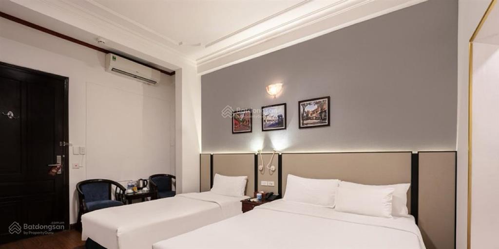 Mai hắc đế, hai bà trưng, 105m2, 7 tầng thang máy, lô góc, khách sạn 21 phòng, dòng tiền 100 triệu