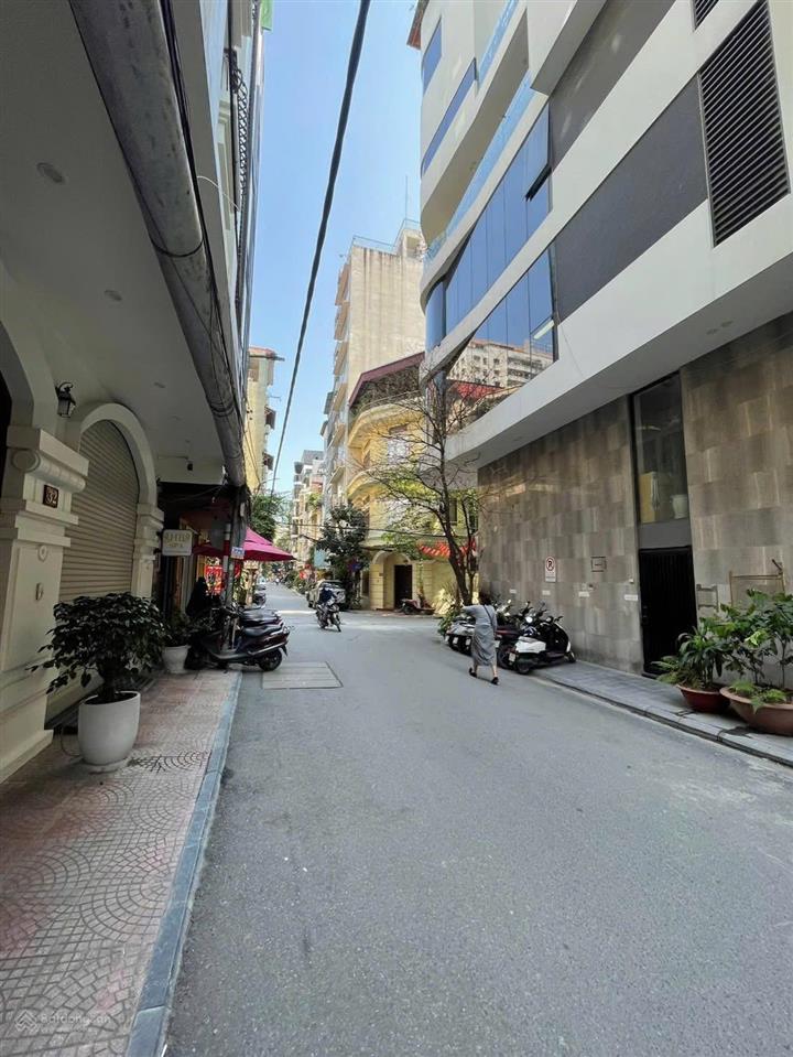 Bán toà văn phòng phố nguyên hồng  huỳnh thúc kháng, 60m2 x 10t. mt 5m. 37 tỷ, ô tô tránh