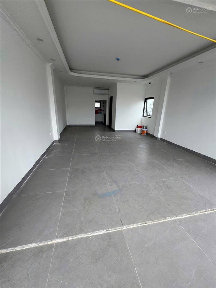 Bán toà văn phòng phố nguyên hồng  huỳnh thúc kháng, 60m2 x 10t. mt 5m. 37 tỷ, ô tô tránh