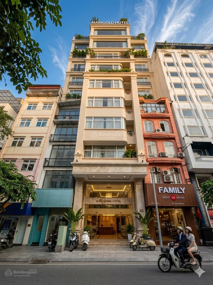 Bán toà văn phòng phố nguyên hồng  huỳnh thúc kháng, 60m2 x 10t. mt 5m. 37 tỷ, ô tô tránh