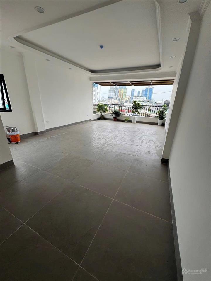 Bán toà văn phòng phố nguyên hồng  huỳnh thúc kháng, 60m2 x 10t. mt 5m. 37 tỷ, ô tô tránh