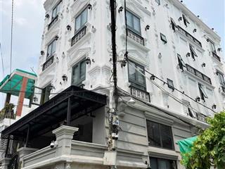 Siêu phẩm dòng tiền 125tr/ thag . dt 106m2 (7,3 x 15) 5 tầng  15 căn hộ  hẻm xe hơi tránh