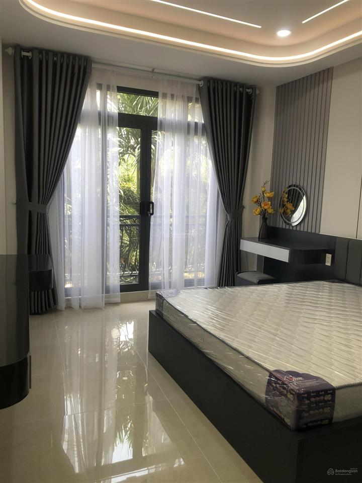 Nhà đẹp hẻm xe hơi ngay gần chợ bà chiểu  bình thạnh  60m2 ( 4x 15)  4 tầng  4pn ,5wc .