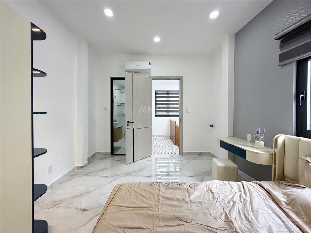 Bán nhà bình thạnh  xe hơi đỗ cửa  50m² (4,6 x 12)  4 tầng  ngay gần chợ bà chiểu