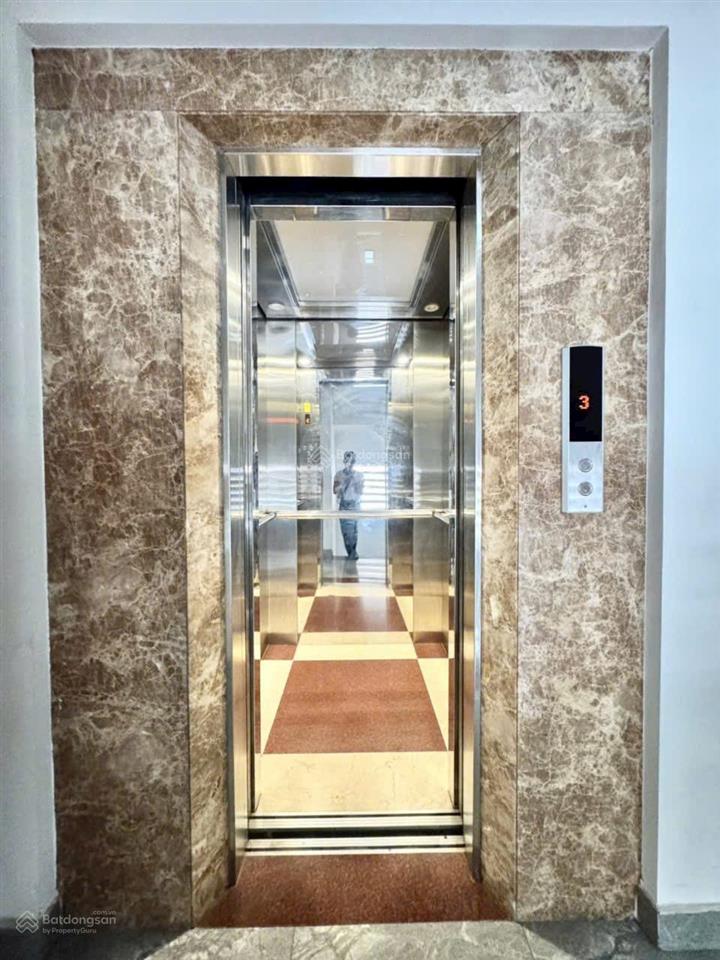 Gấp bán nhà trung tâm phú nhuận 103m² (5 x 20) 5 tầng  thang máy  xe hơi ngủ nhà  26 tỷ tl