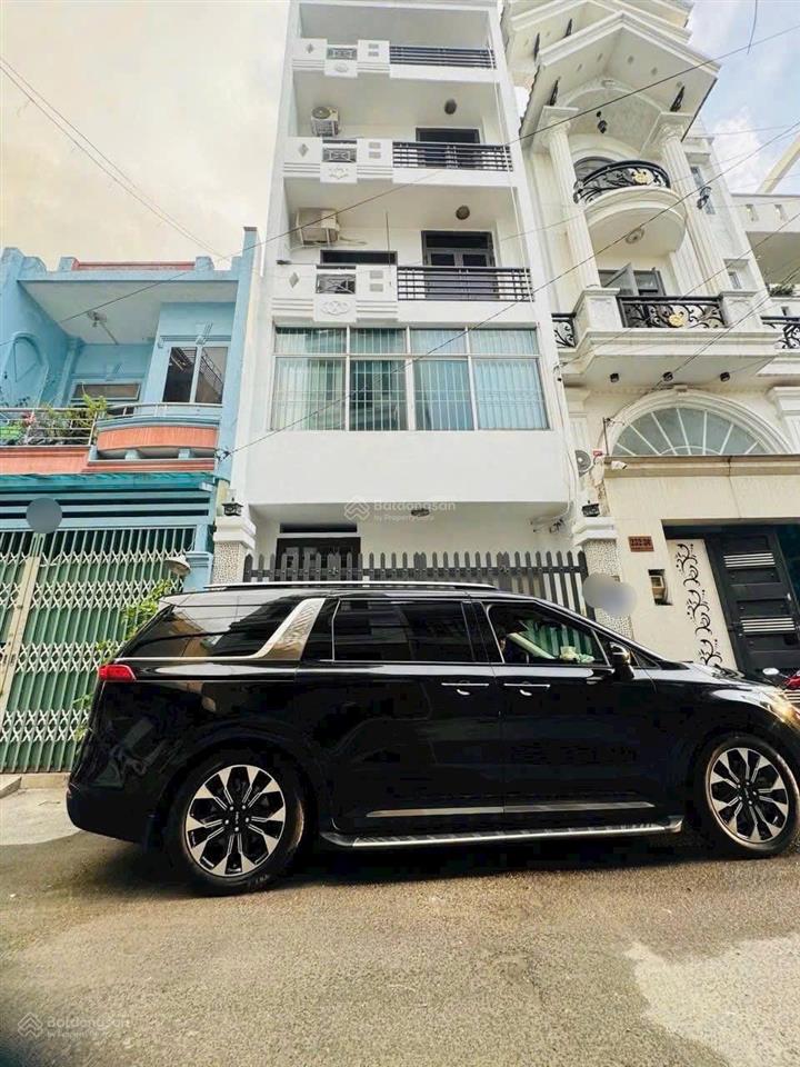 Gấp bán nhà trung tâm phú nhuận 103m² (5 x 20) 5 tầng  thang máy  xe hơi ngủ nhà  26 tỷ tl