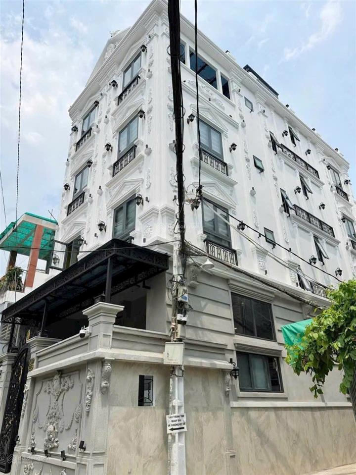 Chính chủ gấp giảm 3 tỷ chdv dòng tiền 125 tr/tháng. 5 tầng thang máy  hẻm xe hơi lê quang định