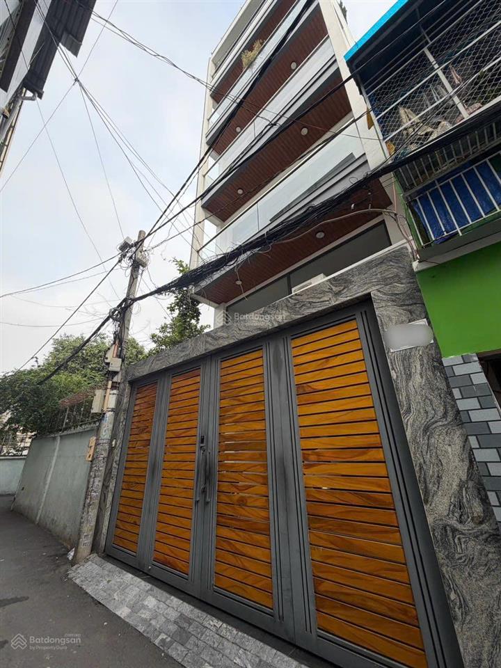 Nhà lê quang định, bình thạnh 121m2 (5x25)  7 tầng. hẻm xe hơi  18,9 tỷ