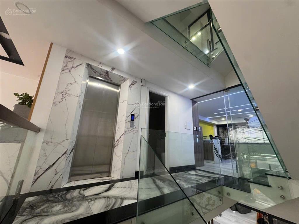 Nhà lê quang định, bình thạnh 121m2 (5x25)  7 tầng. hẻm xe hơi  18,9 tỷ
