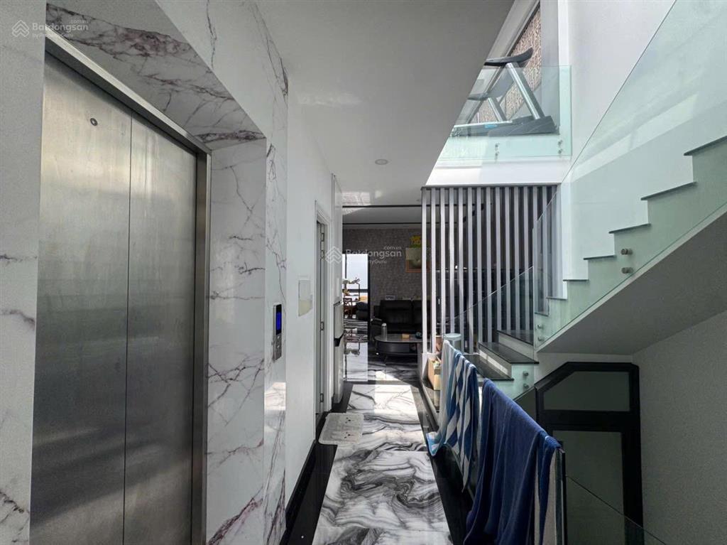 Nhà lê quang định, bình thạnh 121m2 (5x25)  7 tầng. hẻm xe hơi  18,9 tỷ