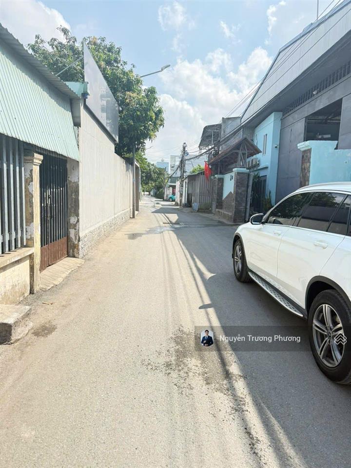 Bán đất 405.7m2(12mx35m) tặng kho mt vĩnh phú 06 sát ql13 ~ 50m  tc 110m2 giá chỉ 14 tỷ shr còn tl