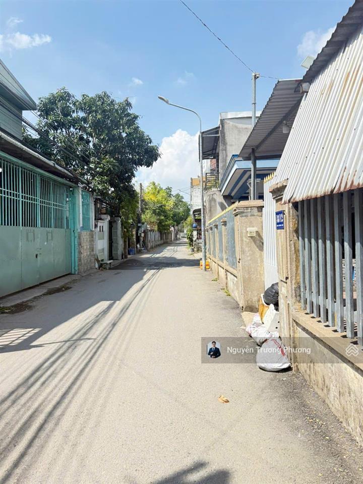 Bán đất 405.7m2(12mx35m) tặng kho mt vĩnh phú 06 sát ql13 ~ 50m  tc 110m2 giá chỉ 14 tỷ shr còn tl