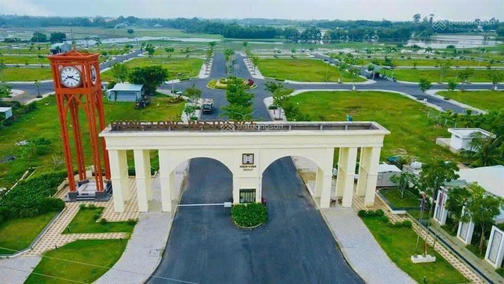 Tôi chính chủ cần bán gấp lô góc 7x20m, sổ hồng sẵn dự án hưng long kế bên vin 930ha