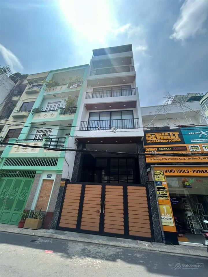 Cho thuê tòa nhà mt đường c18, phường 12. khu văn phòng k300. dt 6x20m. hầm, trệt, 4 lầu. sàn suốt