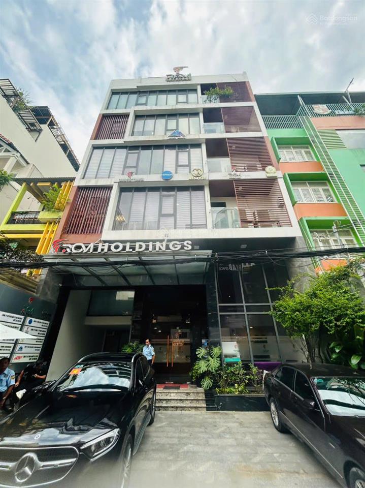 Cho thuê tòa nhà mt đường hát giang, phường 2. dt 11x18m. hầm  7 tầng. pccc, sàn suốt đẹp