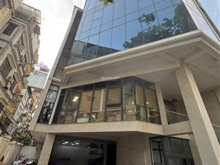 Tòa nhà văn phòng mt trương quốc dung. dt 8x20m. hầm  5 tầng. có trang bị pccc