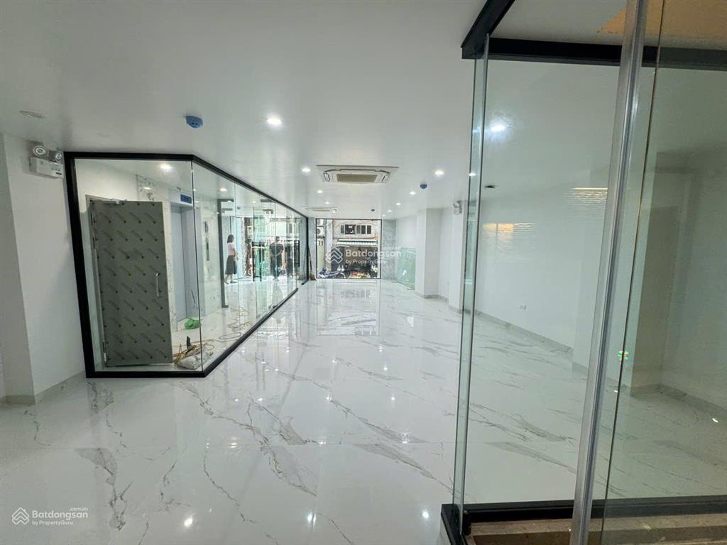 Tòa nhà văn phòng mt trương quốc dung. dt 8x20m. hầm  5 tầng. có trang bị pccc