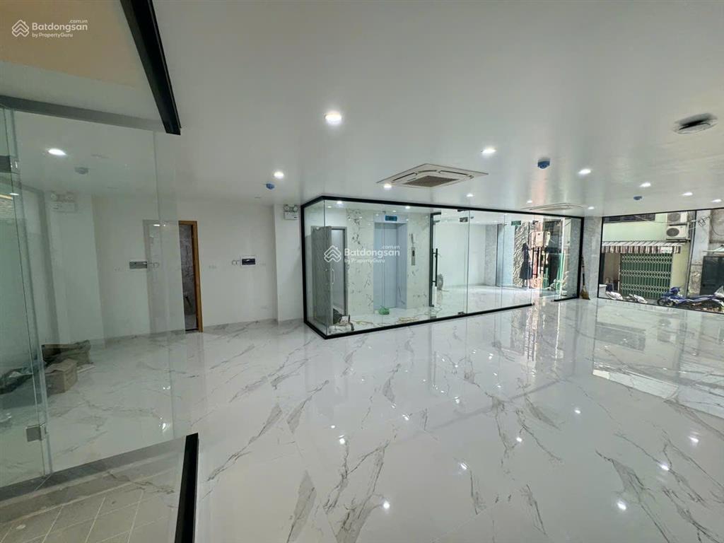 Tòa nhà văn phòng mt trương quốc dung. dt 8x20m. hầm  5 tầng. có trang bị pccc