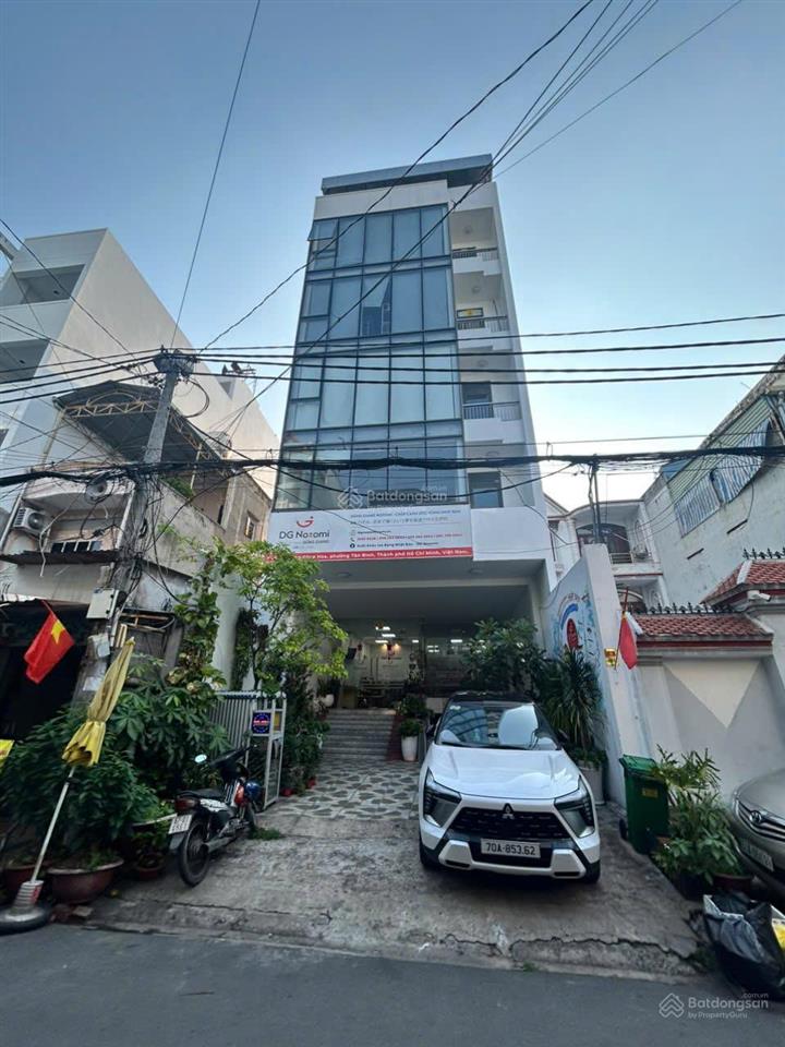 Cho thuê tòa nhà văn phòng hẻm thông cộng hòa. dt 7,5x33m. hầm  6 tầng. sàn trống suốt