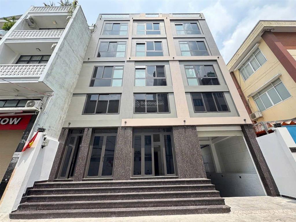 Building cho thuê đường trương công định. ngang 11m. hầm, trệt, 5 lầu. sàn suốt.