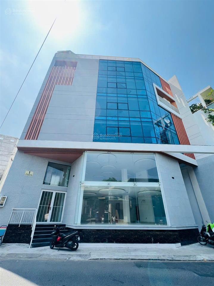 Cho thuê tòa nhà văn phòng khu k300. dt 16x18m. hầm 7 tầng. tòa ốp kính đẹp