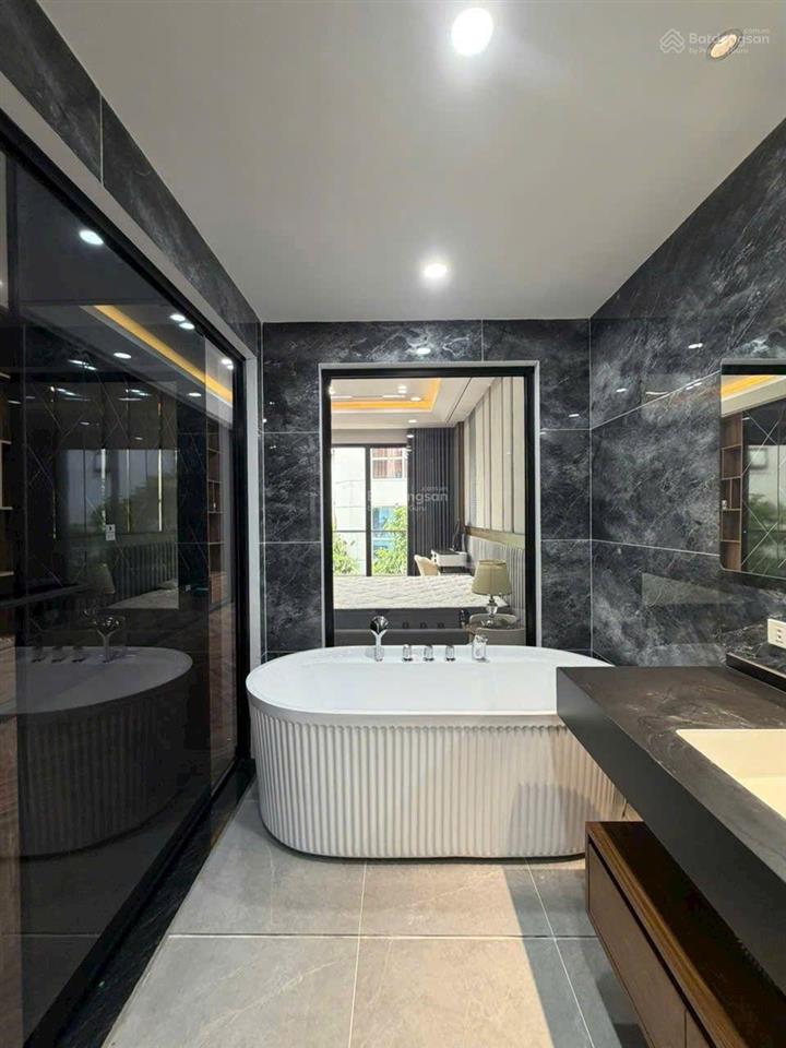 Nhà 55m2 xây 8 tầng, thang máy, full nội thất, gara ô tô, đường 12m ở lâm hạ, bồ đề, hn 31.9 tỉ