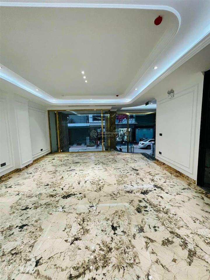 Nhà mới xây phố trần duy hưng  nguyễn khang thang máy dt 63m2 x 7t, 2 ôtô 7 chỗ tầng 1, giá 24tr