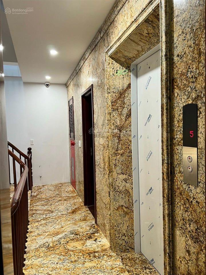 Nhà mới xây phố trần duy hưng  nguyễn khang thang máy dt 63m2 x 7t, 2 ôtô 7 chỗ tầng 1, giá 24tr