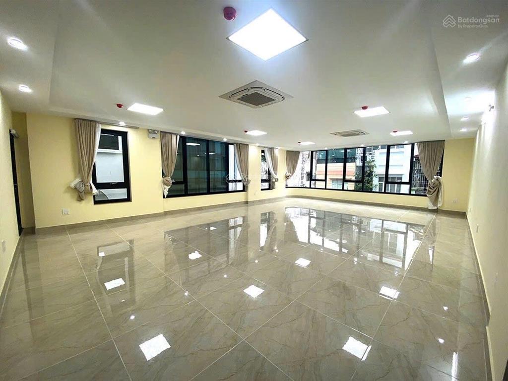 Nhà mặt phố nguyễn phong sắc  trần đăng ninh  cầu giấy dt 100m2x8t mt 6m thông sàn full kính mt