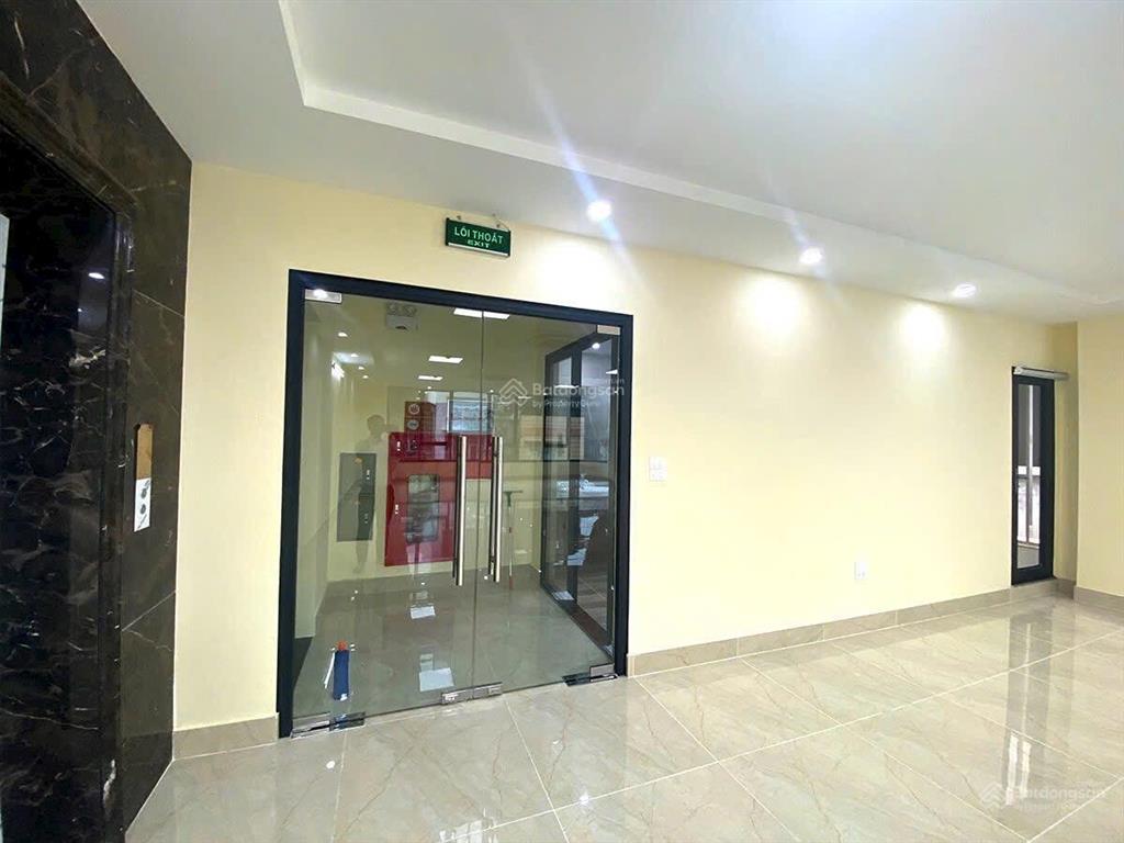 Nhà mặt phố nguyễn phong sắc  trần đăng ninh  cầu giấy dt 100m2x8t mt 6m thông sàn full kính mt