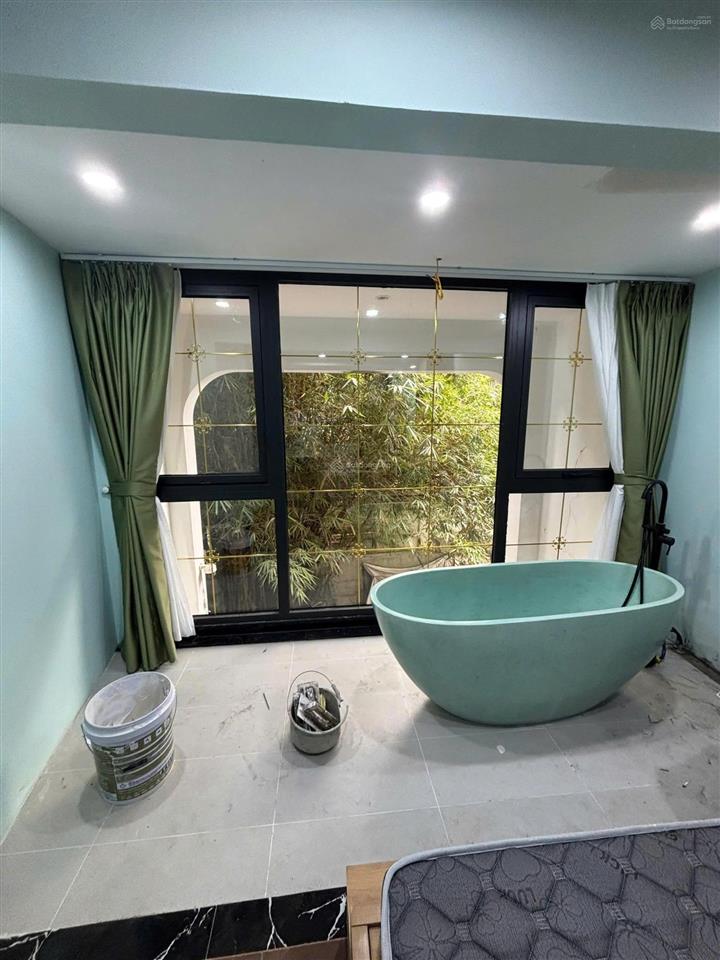 Tòa nhà dòng tiền airbnb phố hồ tùng mậu  9 tầng  xây mới  ô tô tránh