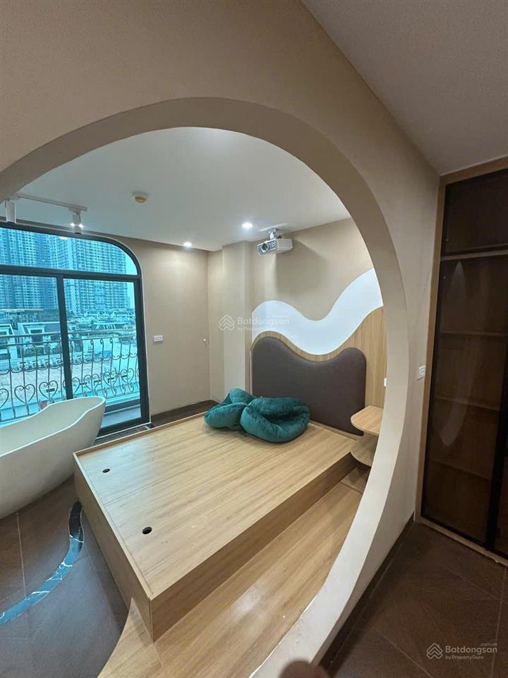 Tòa nhà dòng tiền airbnb phố hồ tùng mậu  9 tầng  xây mới  ô tô tránh