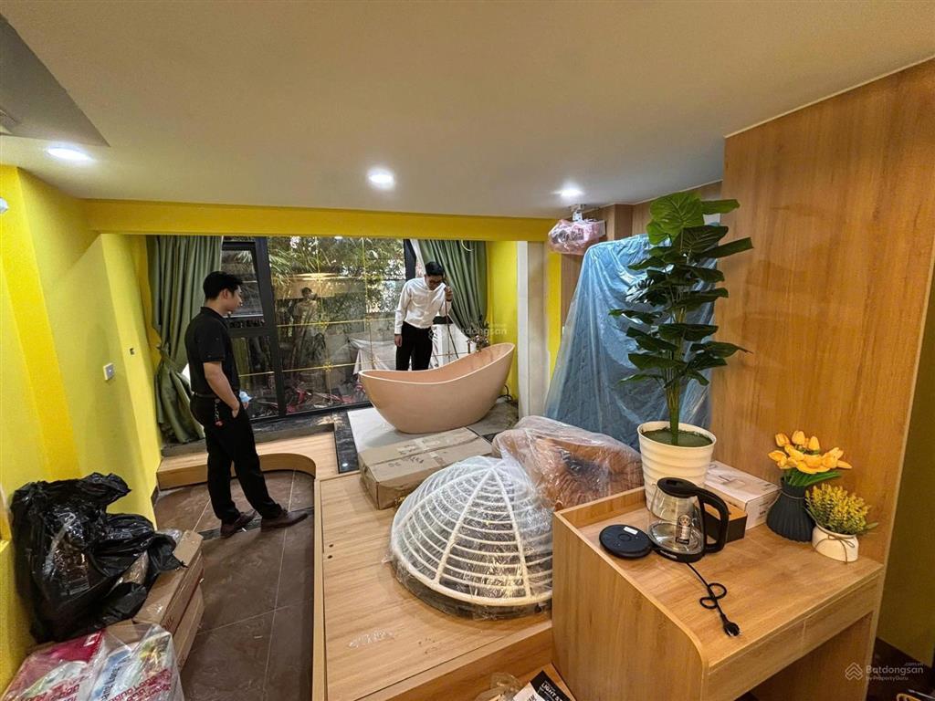Tòa nhà dòng tiền airbnb phố hồ tùng mậu  9 tầng  xây mới  ô tô tránh