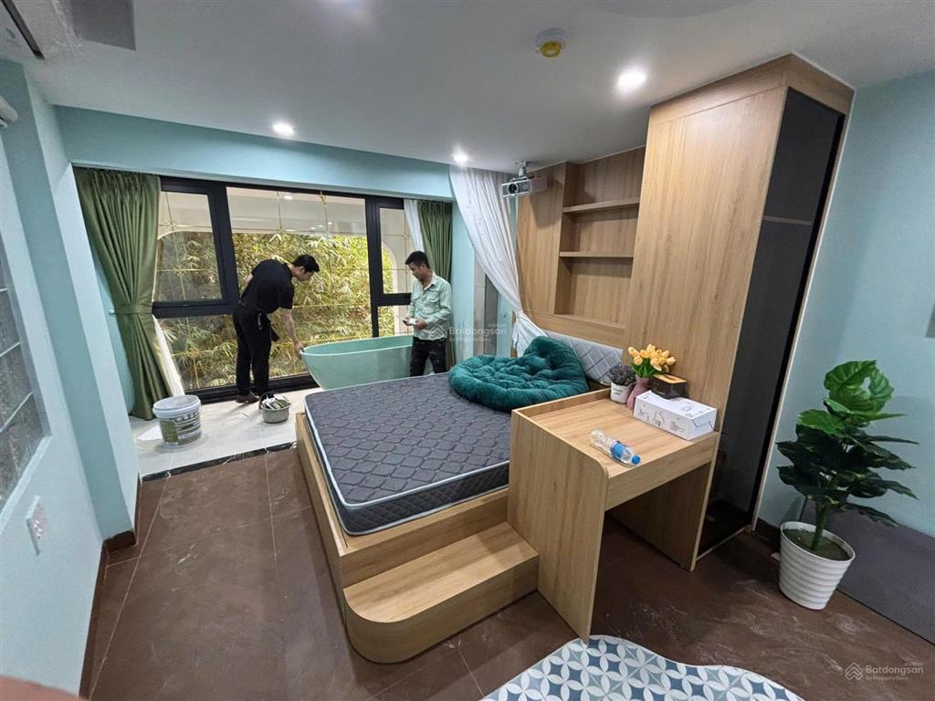 Tòa nhà dòng tiền airbnb phố hồ tùng mậu  9 tầng  xây mới  ô tô tránh