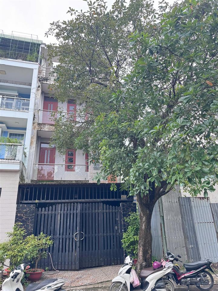 Bán nhà 4 tầng 100m2 mặt tiền kdc thới an  q12  đối diện công viên