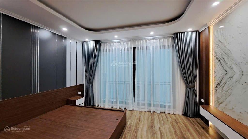 Bán nhà riêng mới 6 tầng thang máy  gara ô tô  phố thạch bàn  40m2  mt4.6m. giá 10.5 tỷ.