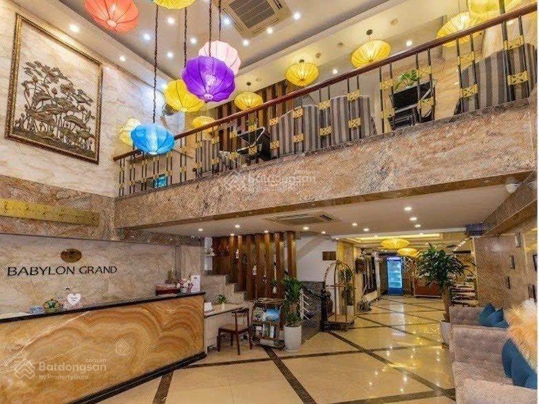 Bán nhà mặt phố phạm hồng thái  ba đình 235m2 13 tầng. doanh thu 450tr/tháng. giá 219 tỷ