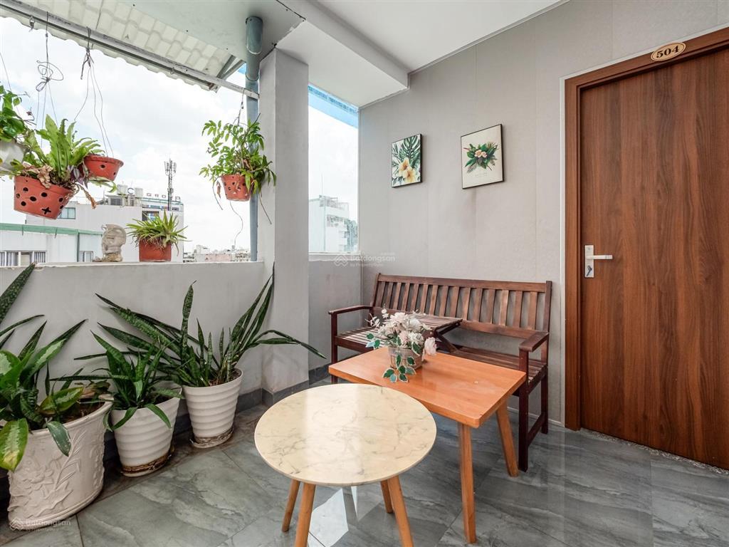 Bán tòa nhà building  33 căn hộ dịch vụ, 1200m2, trung tâm lê văn sỹ, quận 3