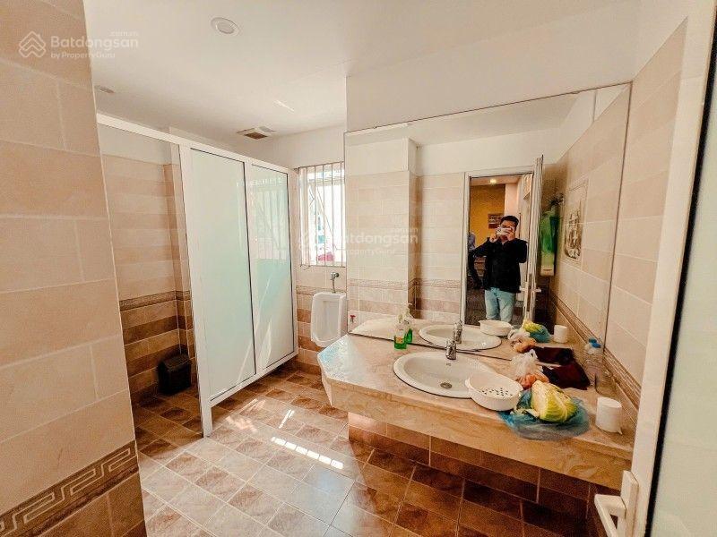 Bán tòa nhà văn phòng mặt phố trung tâm cầu giấy lô góc 105m 9 tầng thang máy 57 tỷ